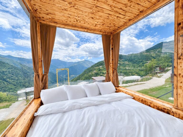 Bed in the glass cabin with a view of the Adjara mountains — Nika Hotel & Club, Georgia